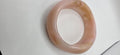 Vintage translucent pink and beige marbled bangle bracelet.