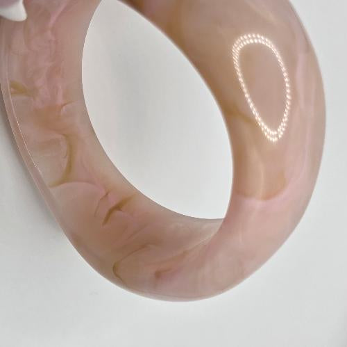 Vintage translucent pink and beige marbled bangle bracelet.